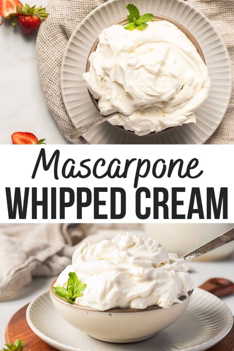 A bowl of creamy mascarpone whipped cream topped with a mint leaf, with a spoon resting inside, is served on a plate alongside fresh strawberries.