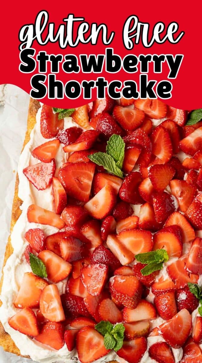 A delicious Gluten Free Strawberry Shortcake topped with whipped cream, fresh strawberries, and mint leaves, set against a vibrant red background with text reading "Gluten Free Strawberry Shortcake.