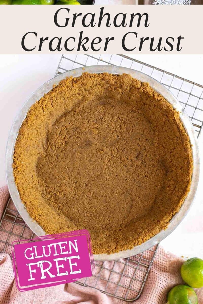 A Gluten-Free Graham Cracker Crust in a pie dish sits on a cooling rack, viewed from above. Text on the image reads "Graham Cracker Crust" and "Gluten Free." Perfect for your next homemade dessert!.