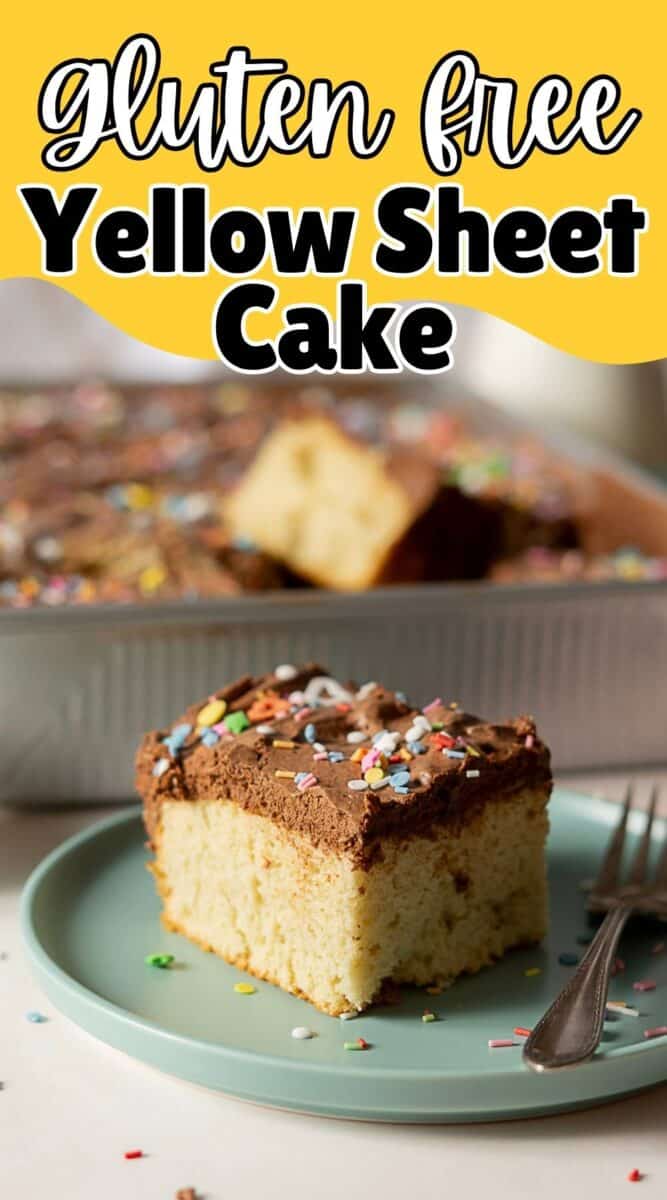 A slice of gluten free yellow cake with chocolate frosting and sprinkles sits on a plate next to a fork, with the rest of the cake in a pan in the background.