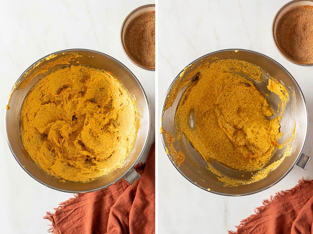 Two metal mixing bowls with orange cookie dough in different stages of mixing, placed on a white surface with a brown napkin and a bowl of cinnamon sugar nearby.