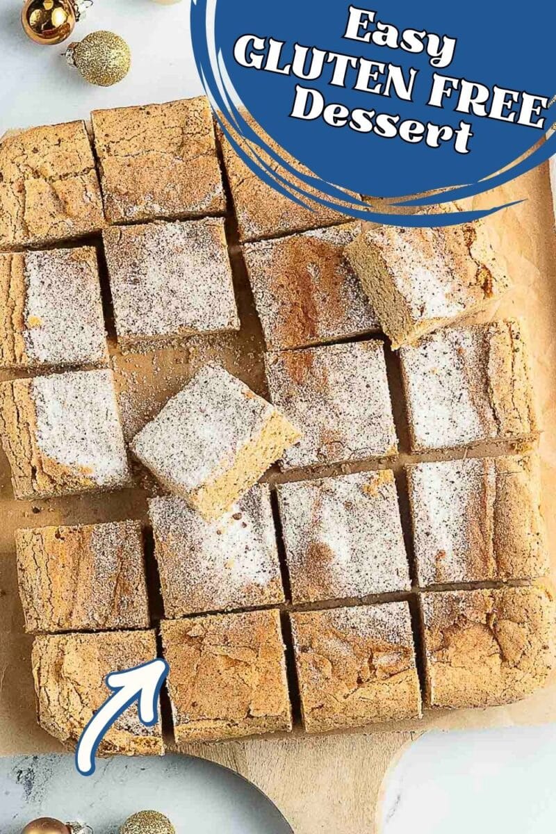 A batch of sixteen powdered sugar-topped gluten free snickerdoodle bars on a wooden board, with text overlay reading "Easy Gluten Free Dessert" and a blue arrow pointing to one bar.