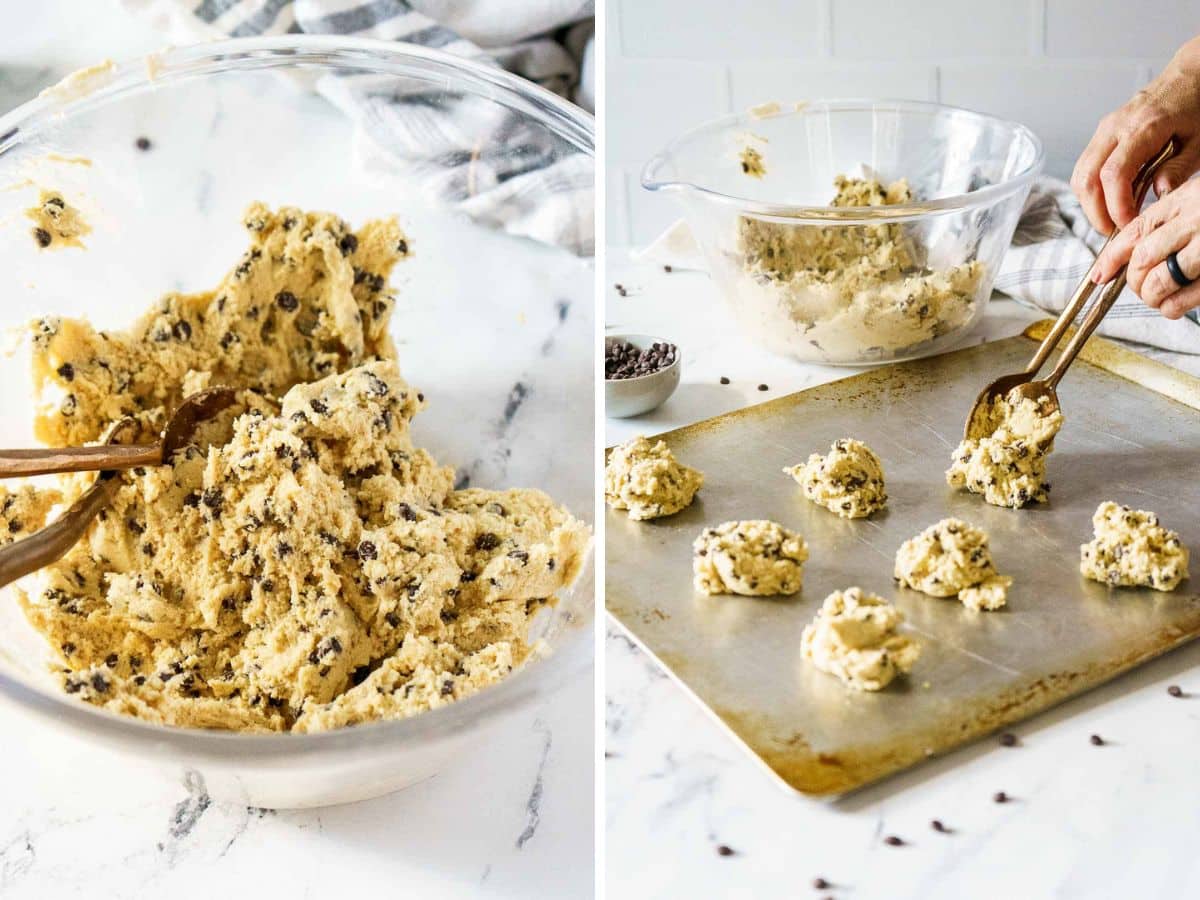 A glass bowl of chocolate chip cookie dough and hands scooping the dough onto a baking sheet with a spoon on a white countertop.