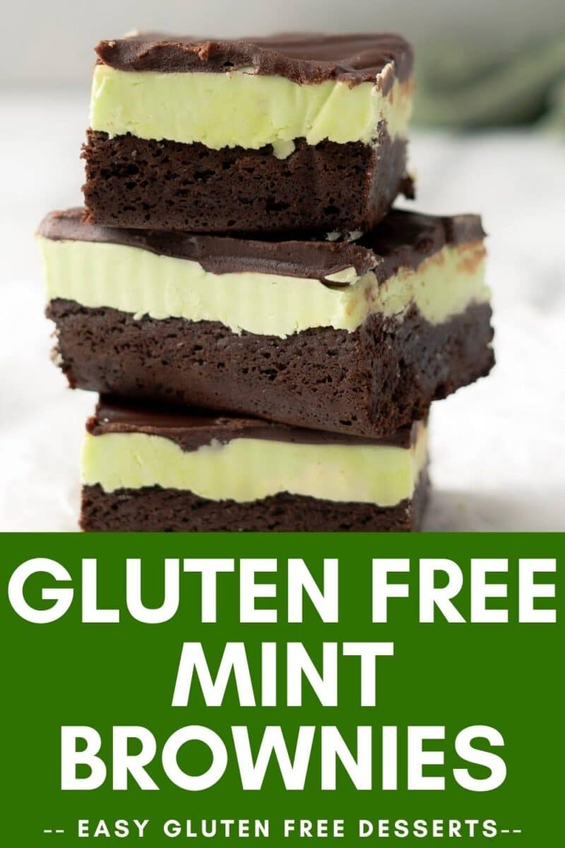 Three stacked gluten free mint chocolate brownies with a chocolate base, mint cream layer, and rich chocolate topping