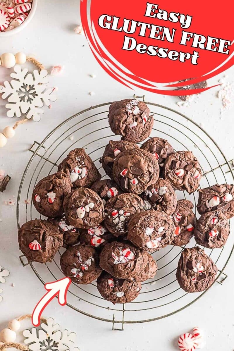 A cooling rack with Gluten Free Chocolate Peppermint Cookies topped with crushed peppermint candies. Text overlay reads "Easy Gluten Free Dessert.