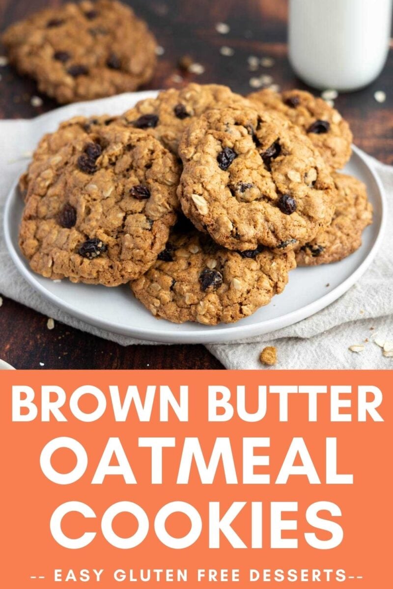 A plate of brown butter oatmeal cookies with raisins is on a table with a glass of milk. Text below reads: "Brown Butter Oatmeal Cookies – Easy Gluten Free Desserts.