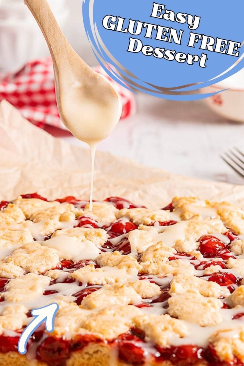 A wooden spoon drizzles glaze over gluten free cherry pie bars with a crumbly topping; text overlay reads "Easy GLUTEN FREE Dessert.