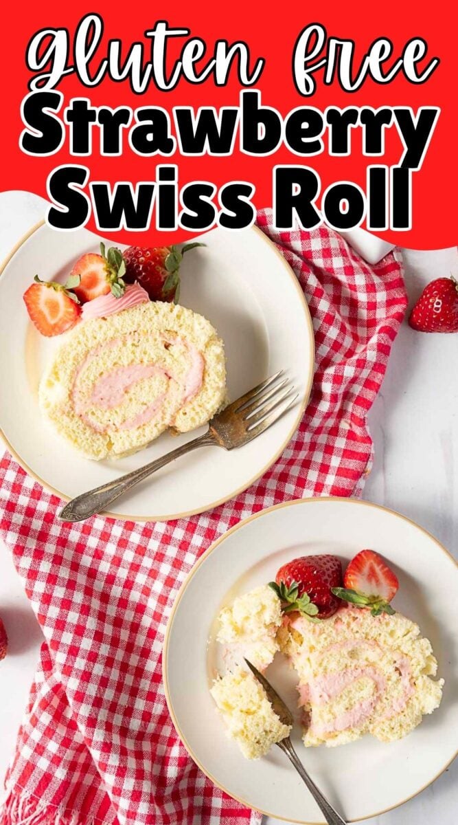 Two plates with slices of gluten-free strawberry Swiss roll and fresh strawberries on a red checkered napkin.