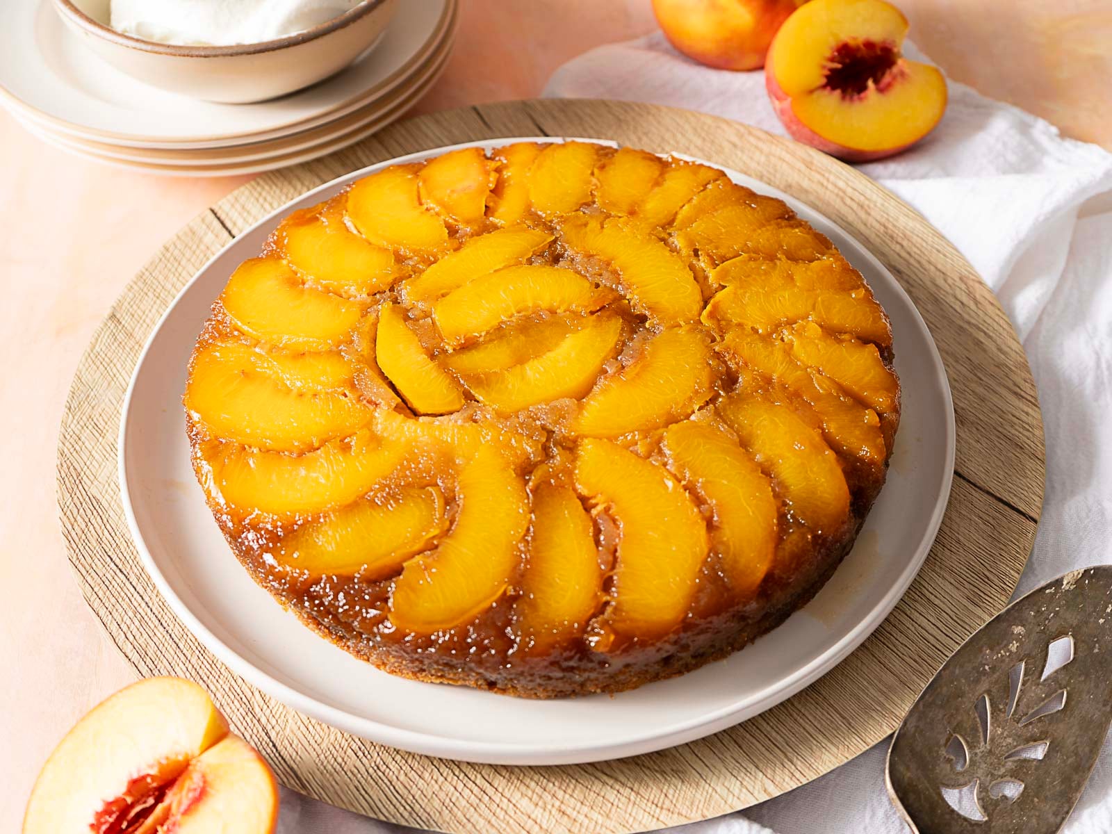 A plate of peach upside down cake.